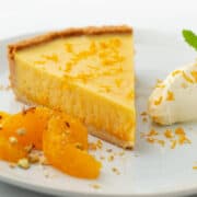 Close up off a slice of an orange tart recipe