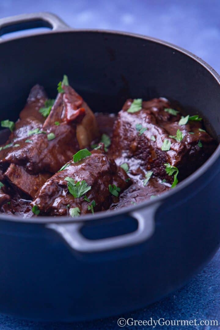 Close-up of braised short ribs after simmering