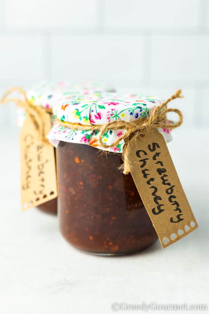 sterilised jars of strawberry chutney.