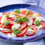 Close up of tomatoes and mozzarella to see how to make a caprese salad