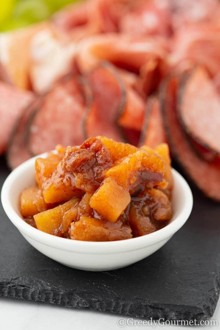 quince chutney in a small white bowl.