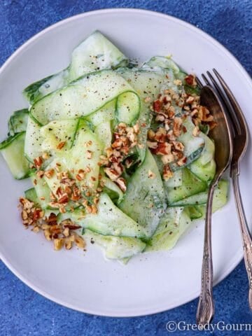 Fresh keto salad made of ribbon cucumber