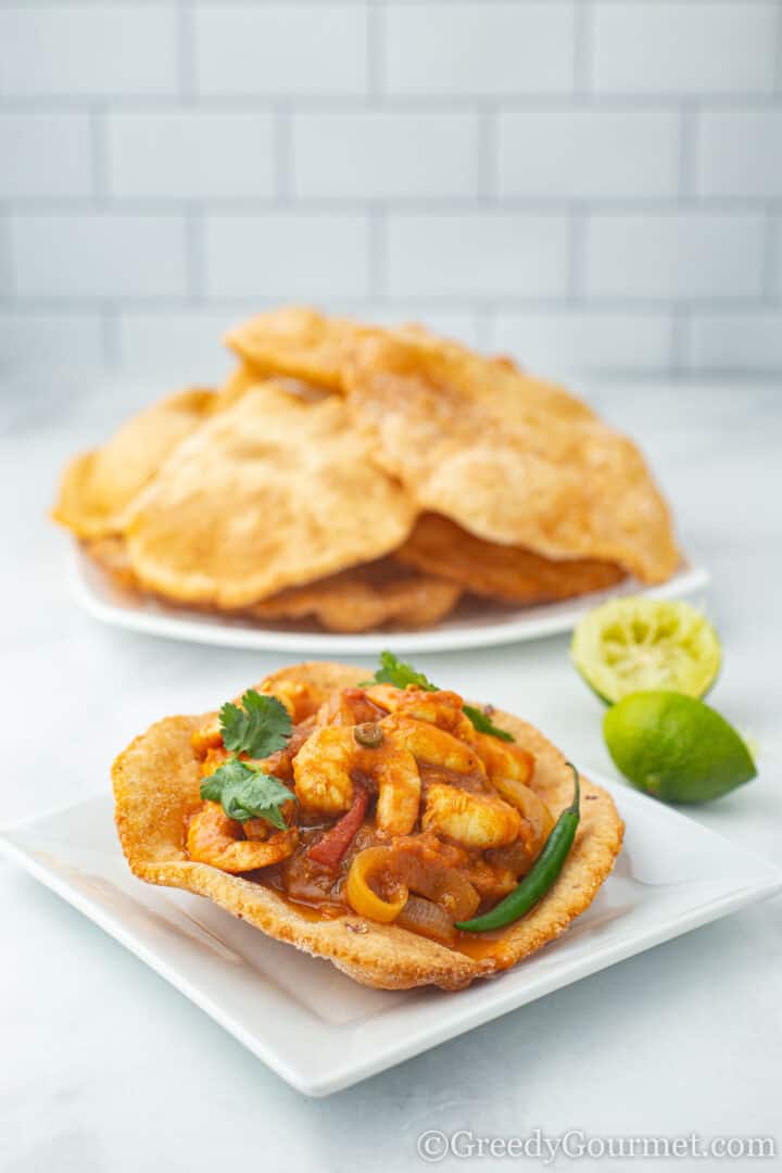 Gluten free puri with prawns, onions and peppers with mint