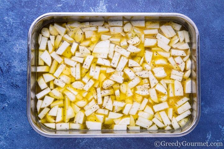 Turnips in dish ready for oven