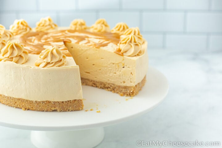 Slice cut out from no bake salted caramel cheesecake.