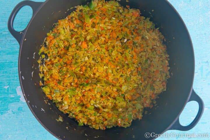 frying onion, carrot and celery.