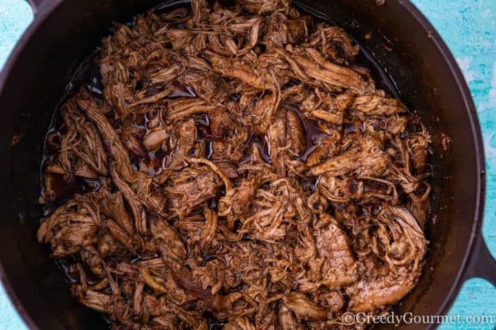 Shredded lamb in saucepan