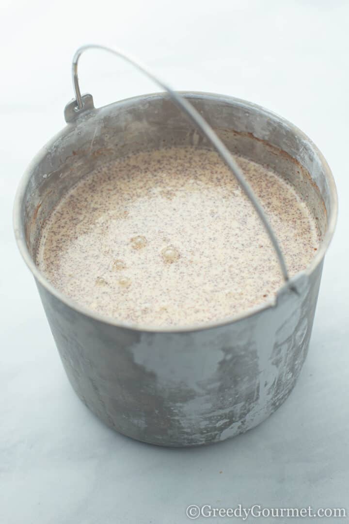 Eggnog mixture in metal bucket