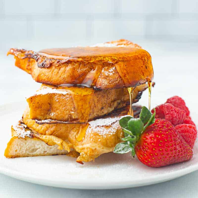 Piled high french toast breakfast