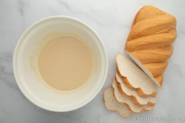 Sliced bread and eggnog mixture