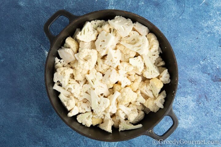 raw cauliflower in a pot.