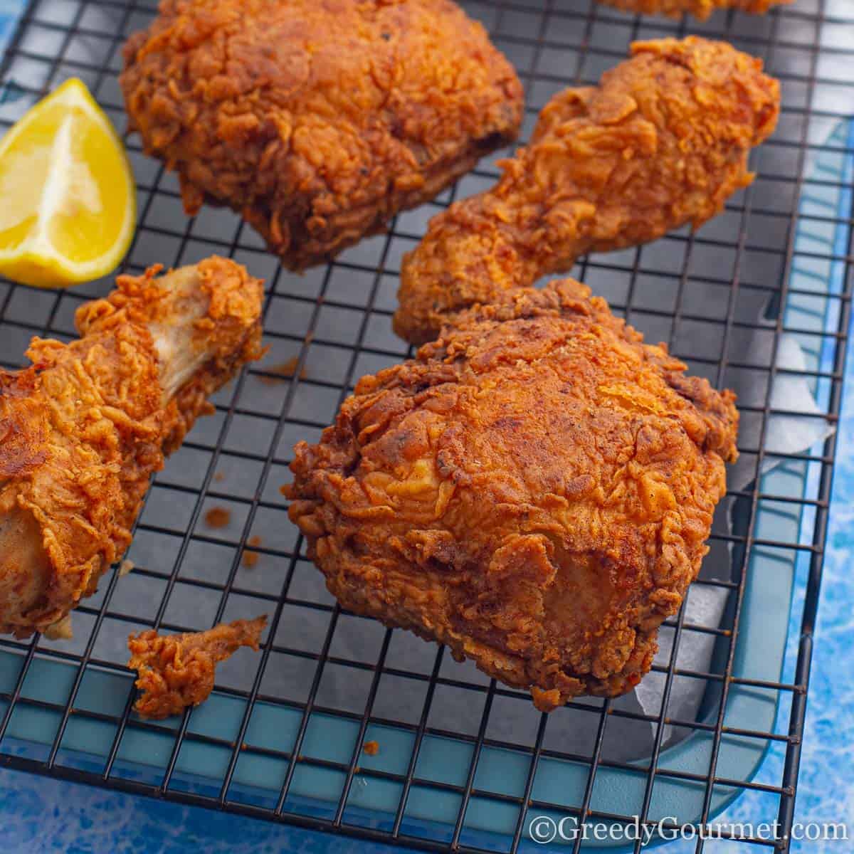 fried chicken on a cooling rack.