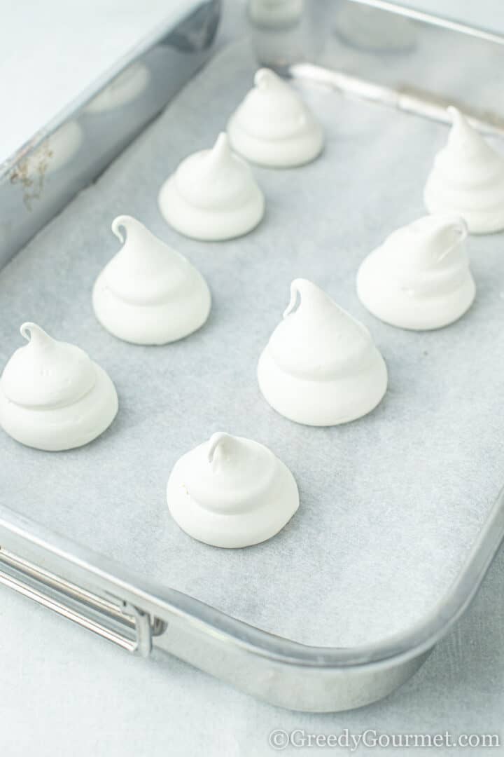 Meringue Ghosts uncooked on baking tray