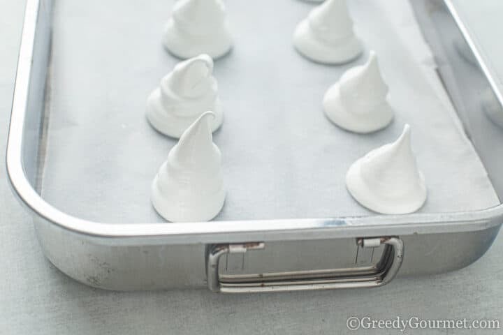 Meringue Ghosts uncooked on baking tray