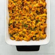 Close up of an Apricot stuffing in a baking dish