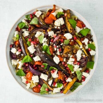Round bowl of a colorful Roasted vegetable Salad,