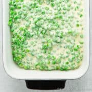 Close up of a vegetarian pea recipe covered in cheese