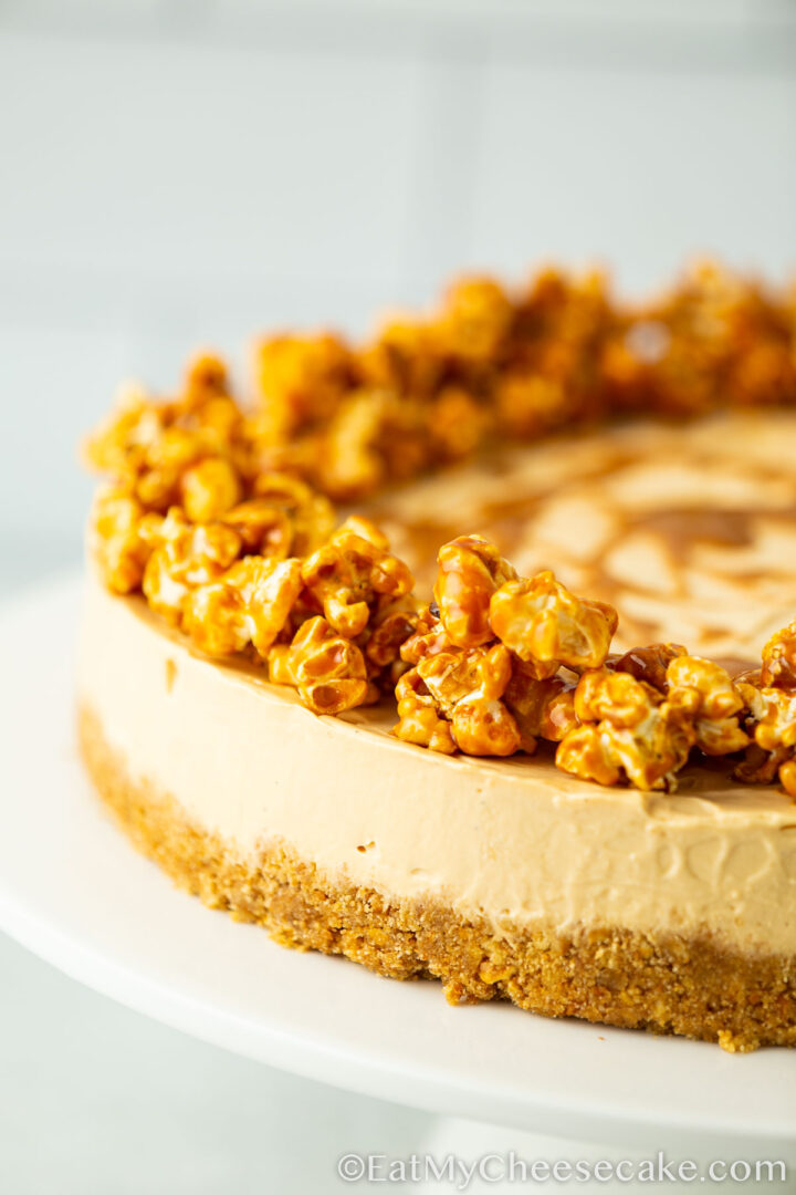 cheesecake decorated with popcorn and caramel.
