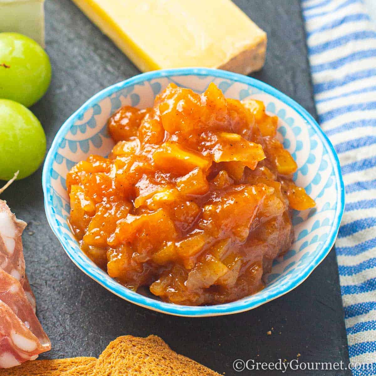 papaya chutney in a small blue bowl.