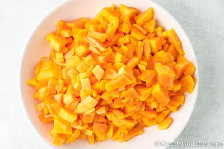 chopped papaya in a bowl