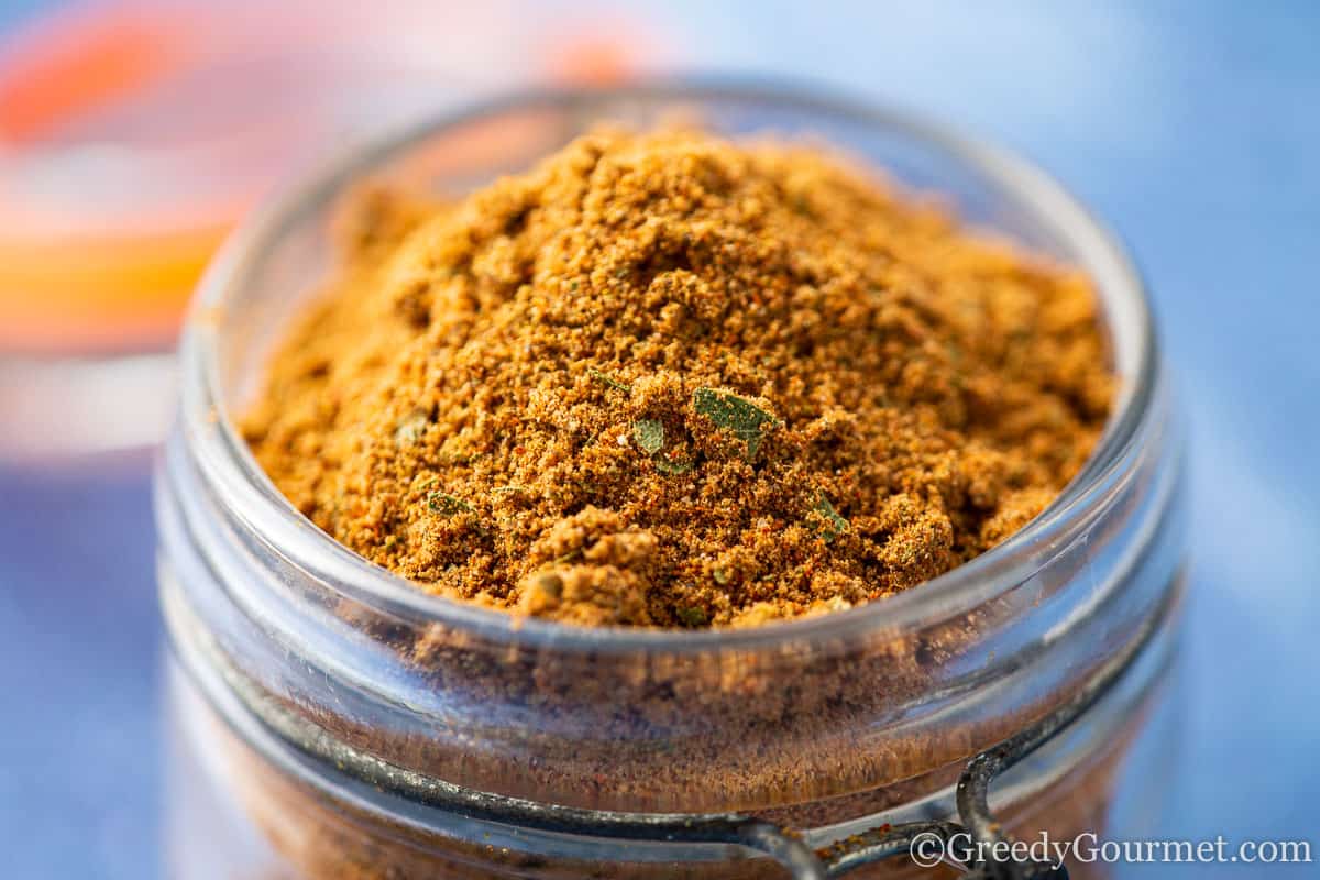 Close up of bay seasoning in a jar.