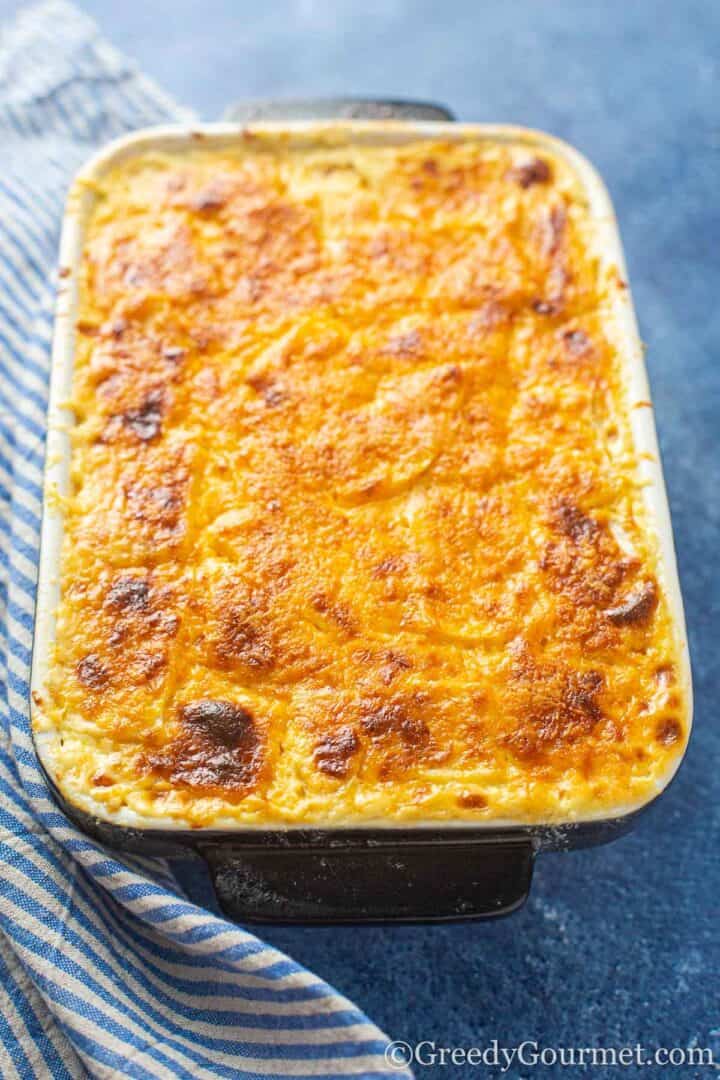 Cooked celeriac gratin in a serving dish.