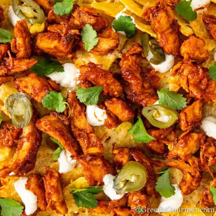 Leftover turkey nachos in a roundup post of leftover turkey recipes.