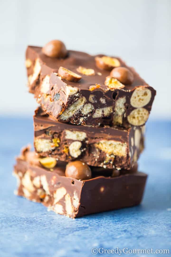 Malteser tiffin bars stacked.