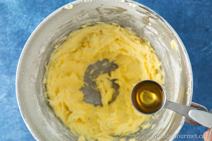 Add brandy to whipped butter and sugar.