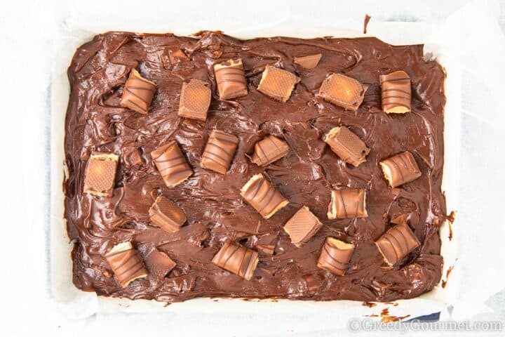 Decorating raw brownie batter.