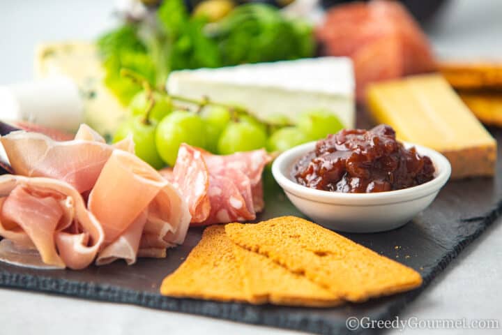 Gooseberry chutney with a charcuterie board.