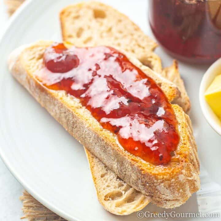 Gooseberry jam on bread slices.