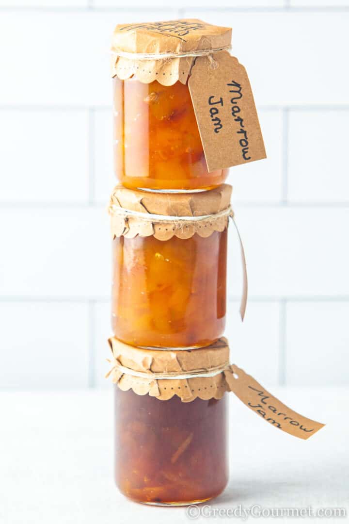 Marrow jam in labelled glass jars.