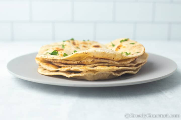 Grey plate with gluten free roti.