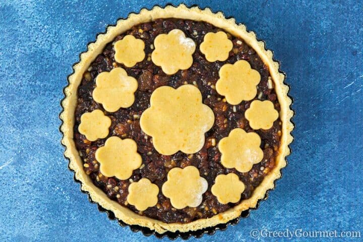 raw decorated mincemeat tart.