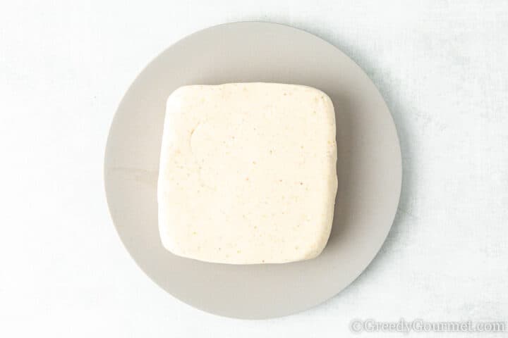 Roti dough on a plate.