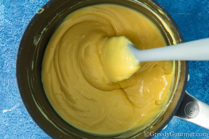 Making eggnog pate in a saucepan.