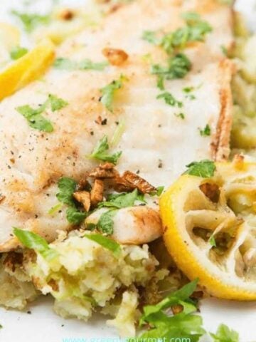 pan-fried-seabass-with-garlic-lemon-butter-sauce-and-spring-vegetables (720 × 1280px)