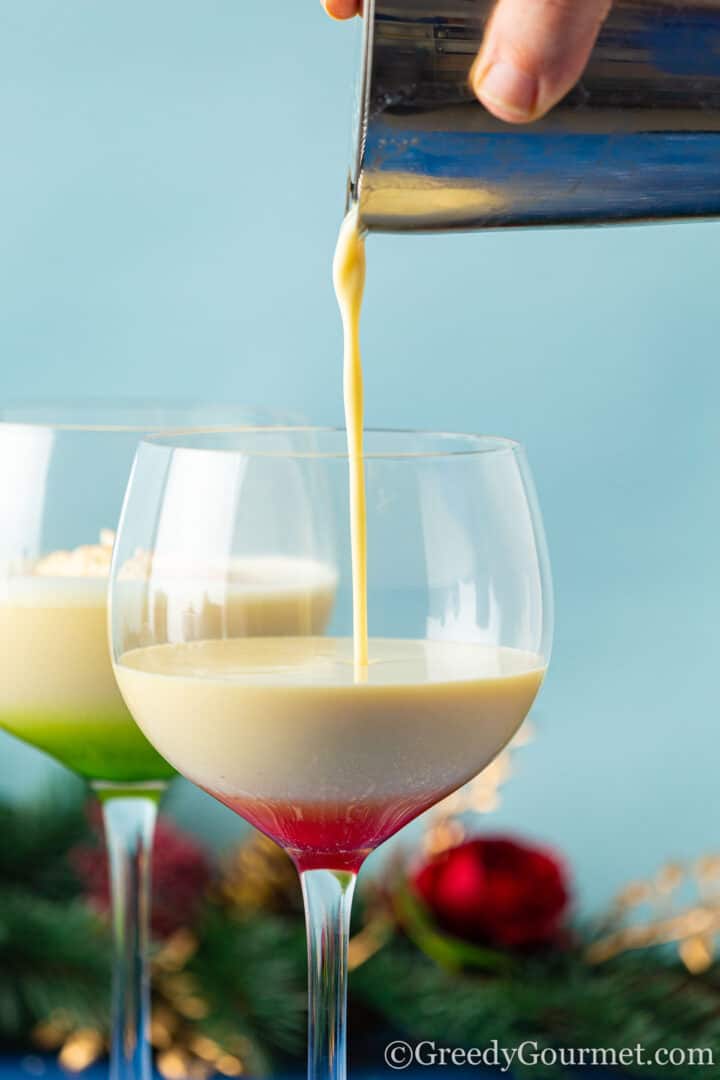 pouring a glass of rumchata eggnog