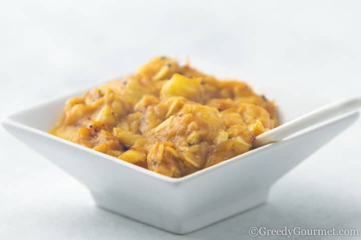 Sautéed marrow seeds in a square white serving dish.