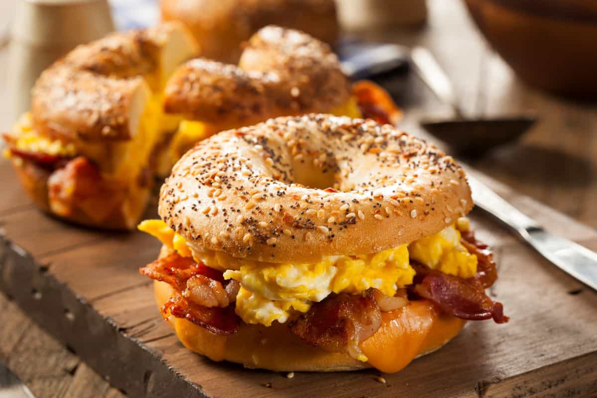 Breakfast bagel with bacon and scrambled egg.