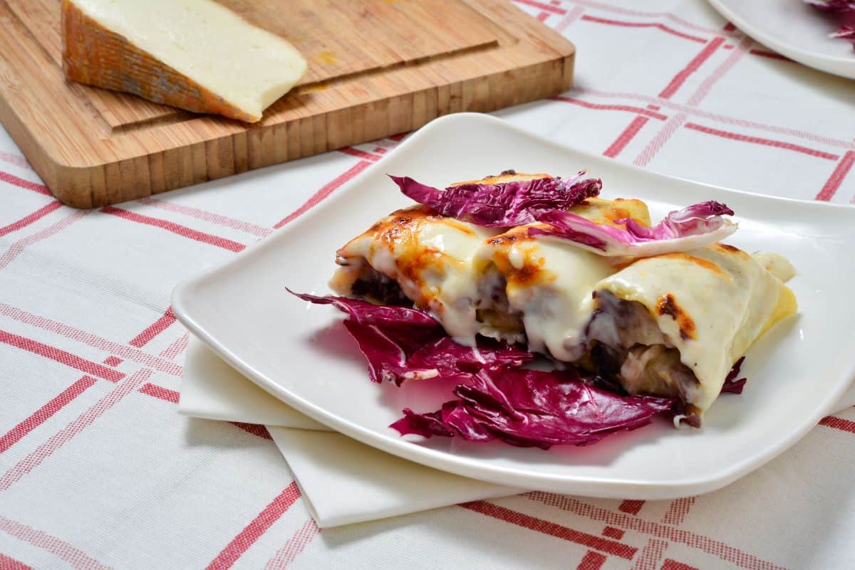 Cannelloni with taleggio cheese fondue.