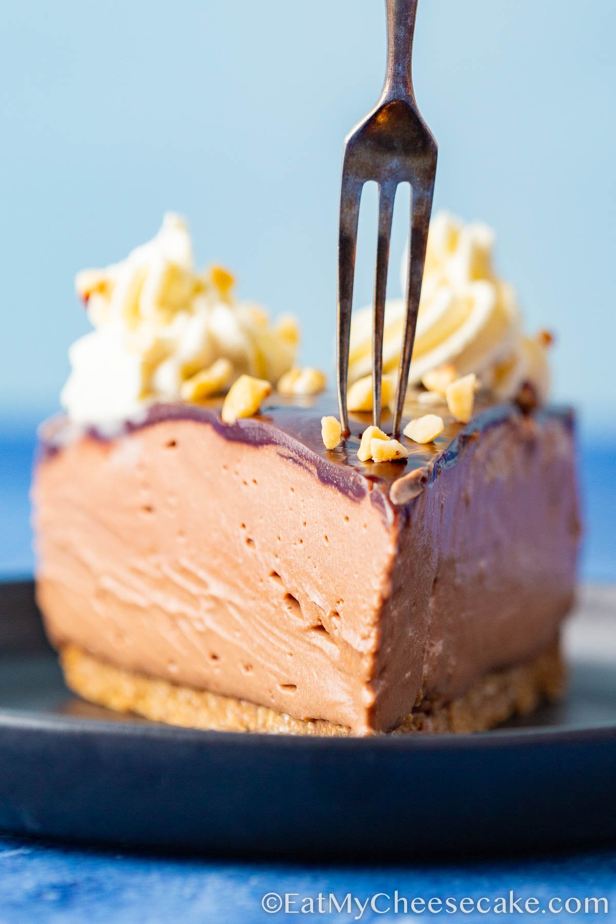 slice of Nutella on a black plate.