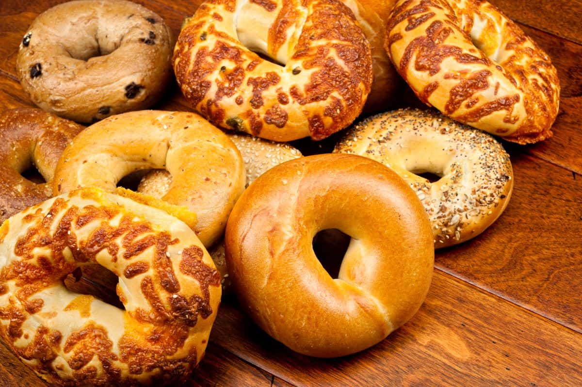 Fresh bagels. Different types of bread.