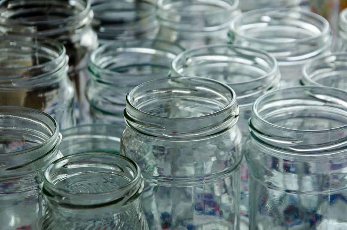 Glass jars ready to be sterilized.