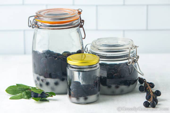 sloe gin in jars.