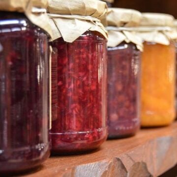 jars of preserved fruit on a shelf.