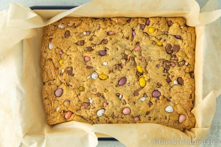 baked cookie dough with mini chocolate eggs.