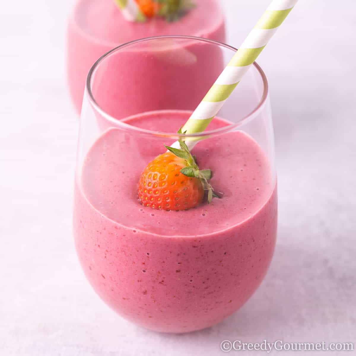 https://www.greedygourmet.com/wp-content/uploads/2022/07/blackberry-strawberry-banana-smoothie-feature.jpg