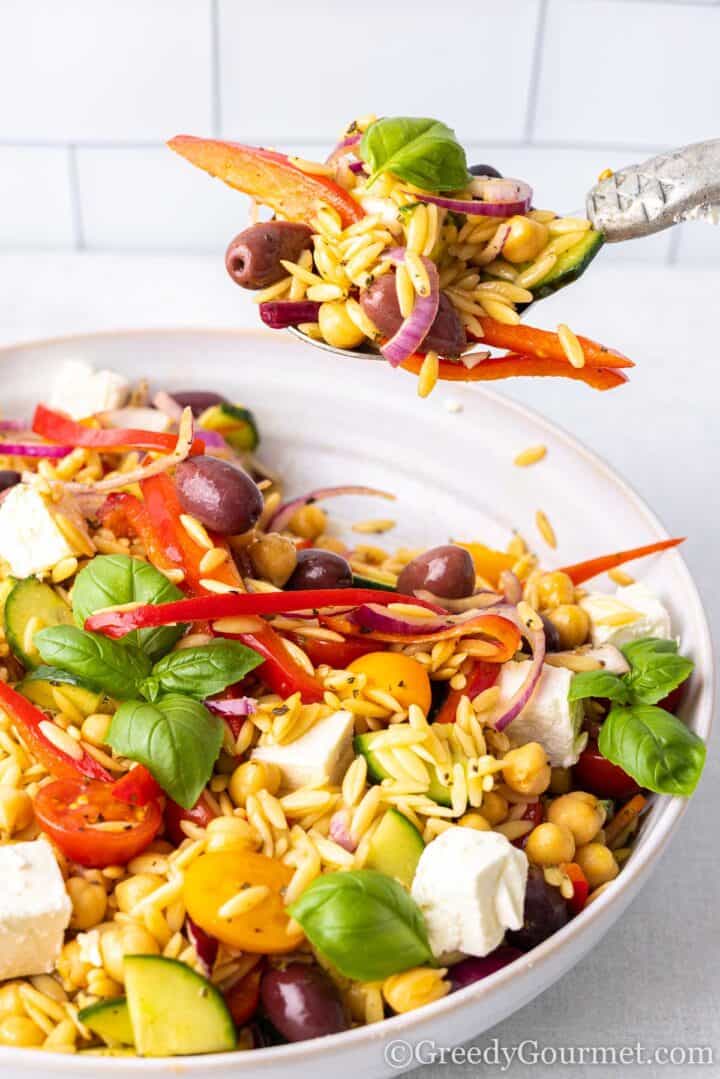forkful of orzo salad.